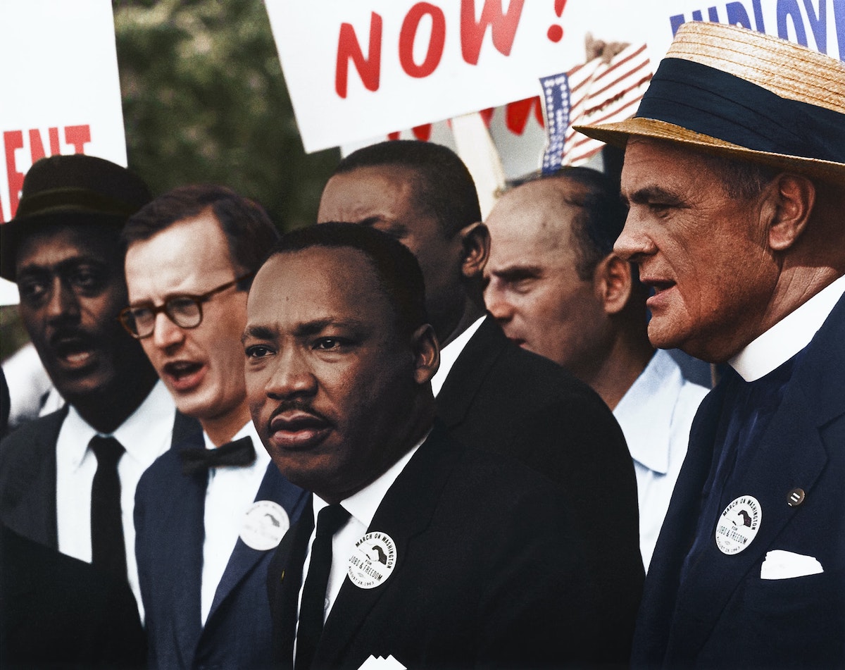 Martin Luther King speaking to crowd at a civil rights march on Washington