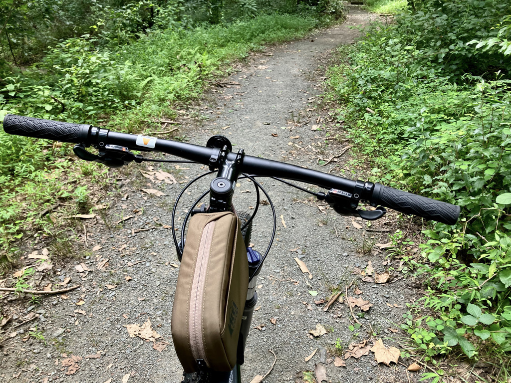 front of bike pointed down a nature trail