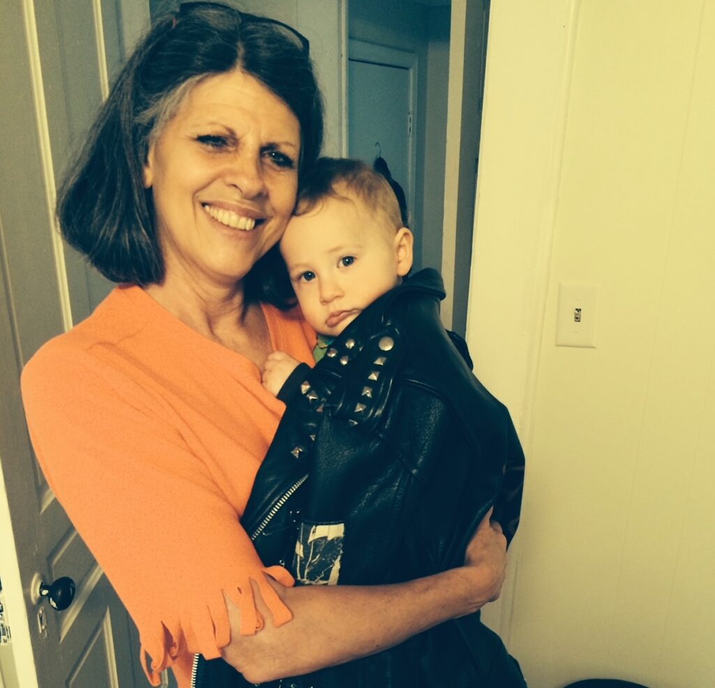My mom and my son (her grandson) who is wearing a black punk rock leather jacket. My mom once tried to levitate in our backyard on April Fools' Day
